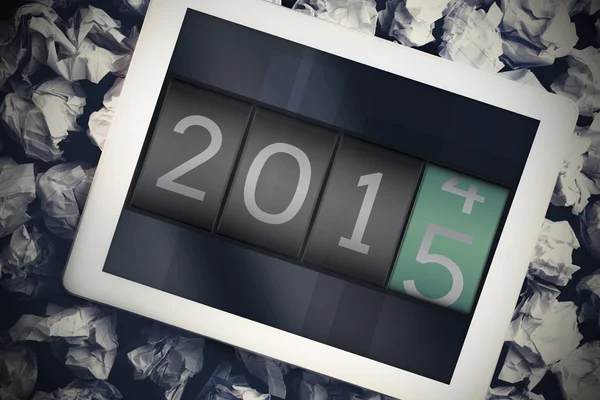 2014 förändras till 2015 mot tablet — Stockfoto