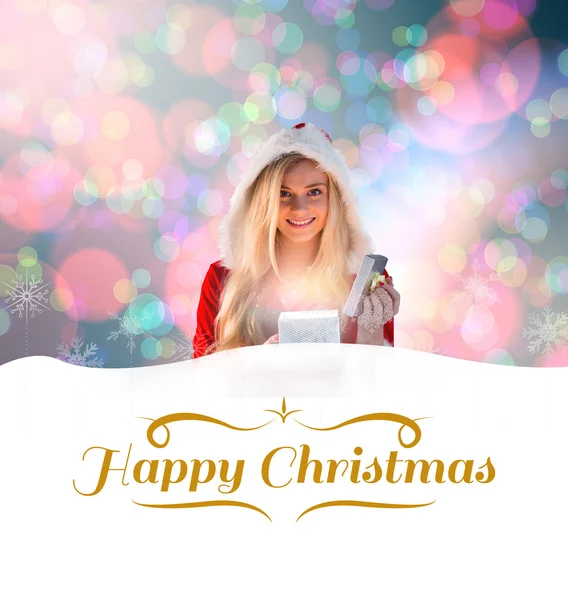 Sexy santa girl opening gift — Stock Photo, Image