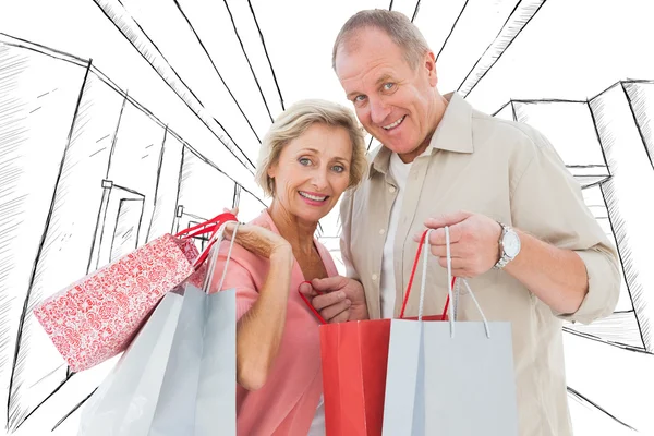 Paar mit Einkaufstaschen — Stockfoto