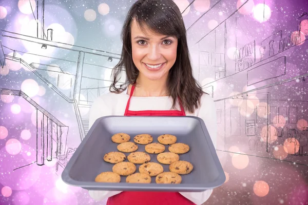 Brünette bietet heiße Plätzchen an — Stockfoto