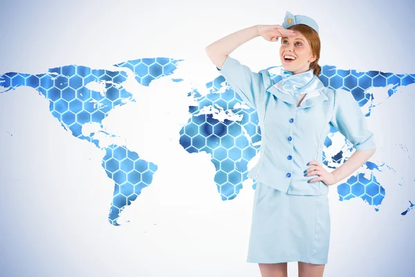 Pretty air hostess looking up — Stock Photo, Image