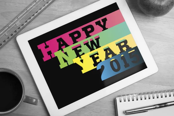 New year against overhead of tablet — Stock Photo, Image