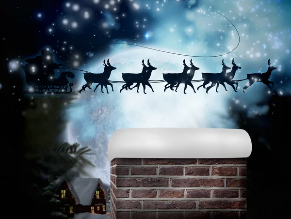 Santa flying his sleigh — Stock Photo, Image