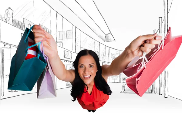 Mujer de pie con bolsas de compras — Foto de Stock