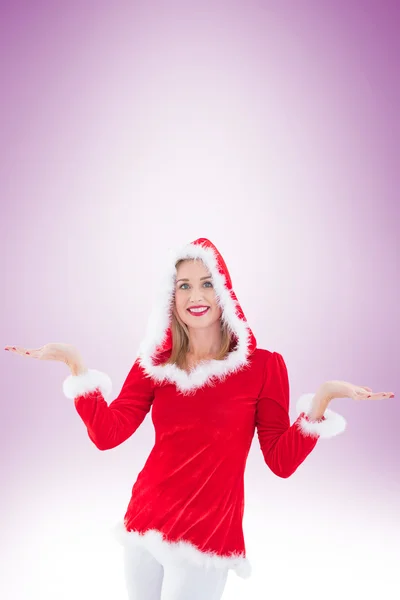 Festive blonde holding hands out — Stock Photo, Image