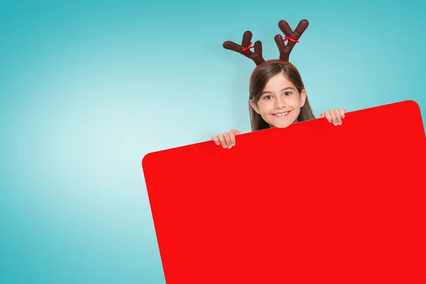 Festive little girl showing card — Stock Photo, Image