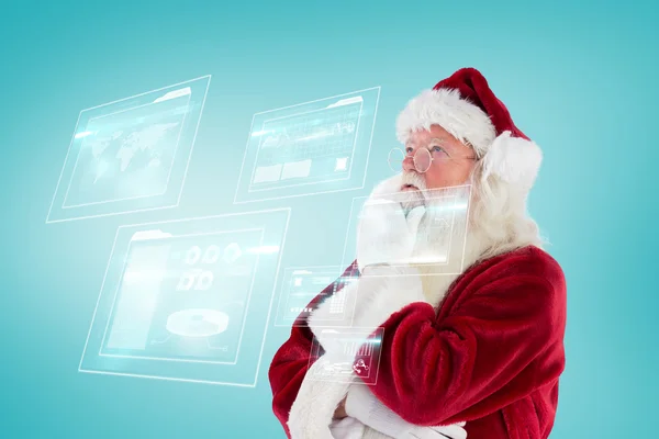 Santa is het denken over iets — Stockfoto