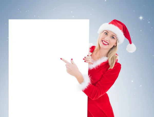 Festive blonde showing white card — Stock Photo, Image