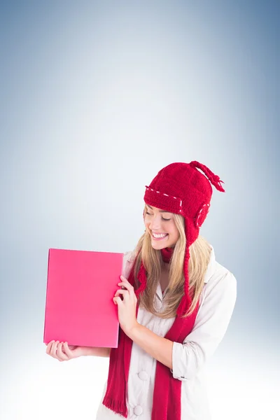 Pretty blonde showing red poster — Stock Photo, Image