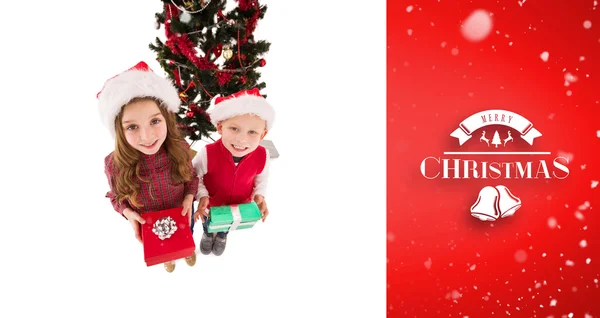 Festive little siblings smiling — Stock Photo, Image