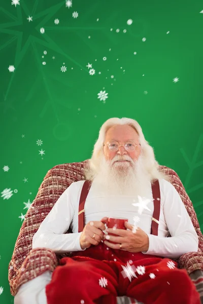 Koltukta oturup Noel Baba — Stok fotoğraf