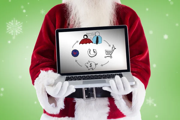 Santa Claus präsentiert einen Laptop — Stockfoto