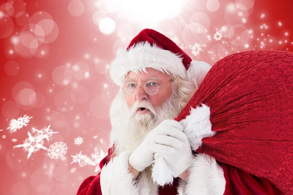Santa holding sack Stock Image