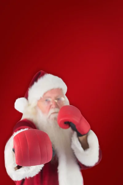 Santa Claus punches with his right — Stock Photo, Image