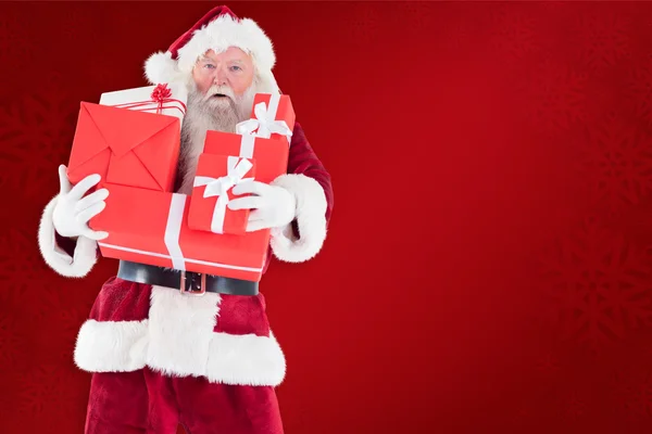 Der Weihnachtsmann bringt ein paar Geschenke mit — Stockfoto