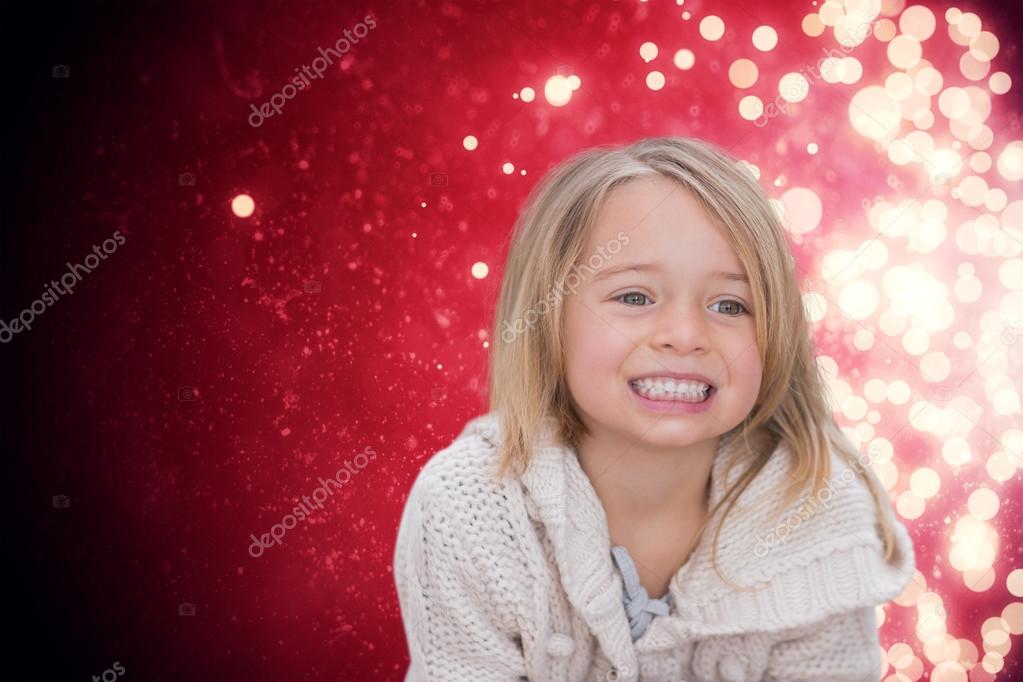 cute little girl against light design shimmering on red — stock