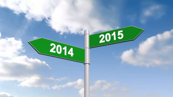 2014 and 2015 signpost against sky — Stock Video