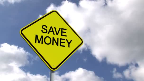 Save money sign against sky — Stock Video