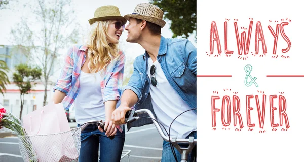 Hip young couple on a bike ride — Stock Photo, Image