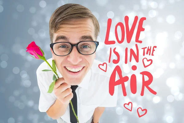 Composite image of romantic geeky hipster — Stock Photo, Image