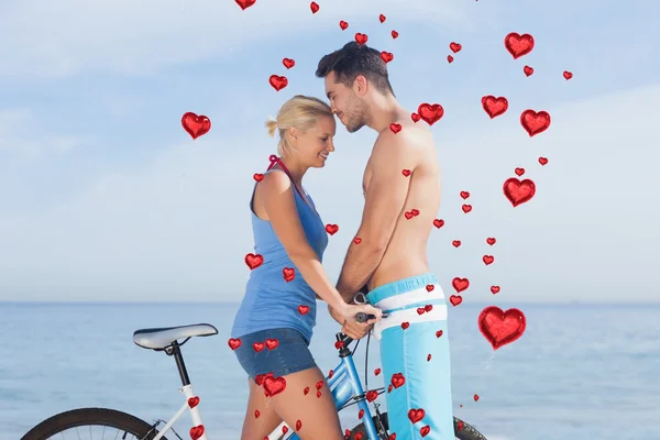 Cute couple together with their bicycles — Stock Photo, Image