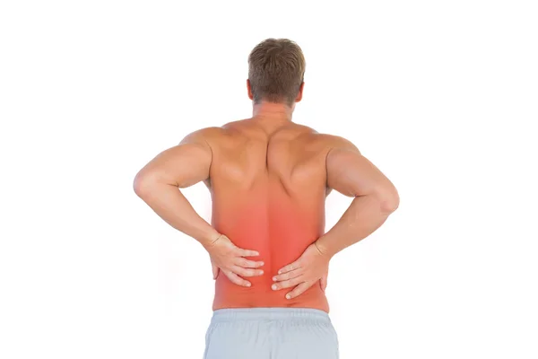 Shirtless man suffering from lower back pain — Stock Photo, Image