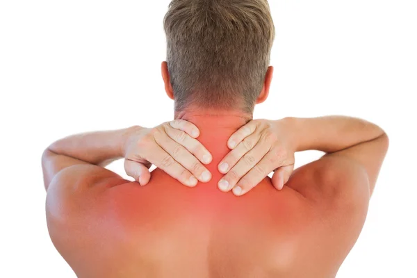 Shirtless man having a neck ache — Stock Photo, Image