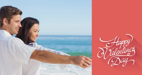 Romantic couple relaxing on the beach — Stock Photo, Image