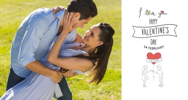 Loving and happy couple dancing in park — Stock Photo, Image