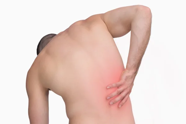 Вид сзади на мужчину без рубашки с болью в спине — стоковое фото