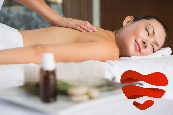 Content brunette getting a back massage — Stock Photo, Image
