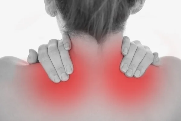 Closeup of of woman massaging neck — Stock Photo, Image