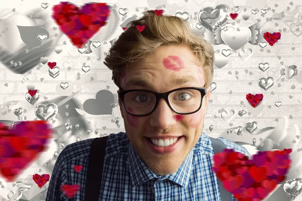 Geeky hipster covered in kisses — Stock Photo, Image