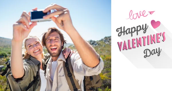 Hiking couple standing on mountain — Stock Photo, Image