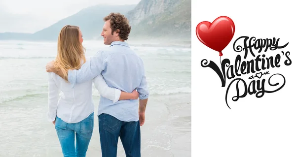 Rear view of a romantic couple at beach — Stock Photo, Image