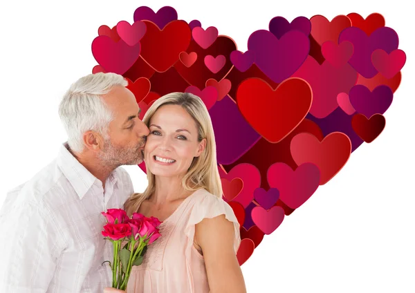 Affectionate man kissing his wife — Stock Photo, Image