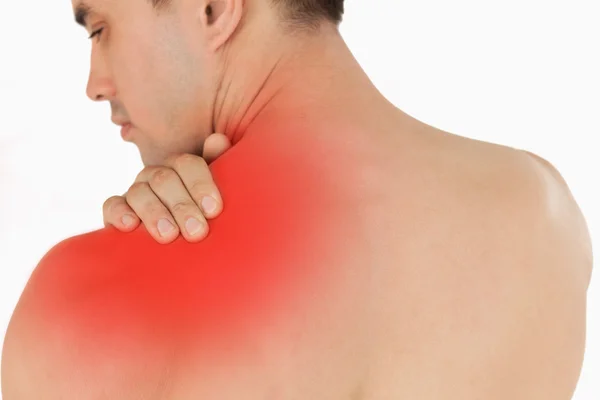 Jovem homem com dor no pescoço — Fotografia de Stock