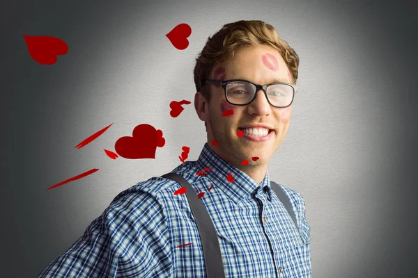 Geeky hipster covered in kisses — Stock Photo, Image