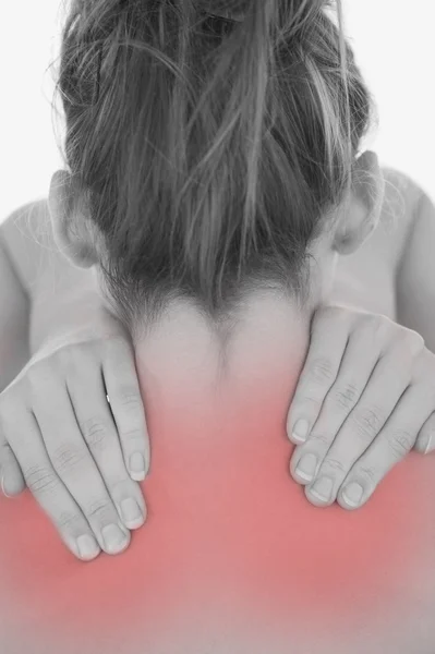 Mujer joven masajeando cuello — Foto de Stock