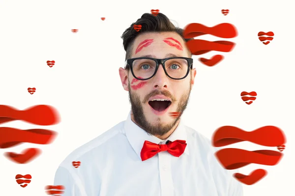 Geeky hipster with kisses on his face — Stock Photo, Image