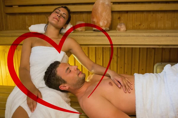 Liefdevol paar ontspannen in de sauna — Stockfoto