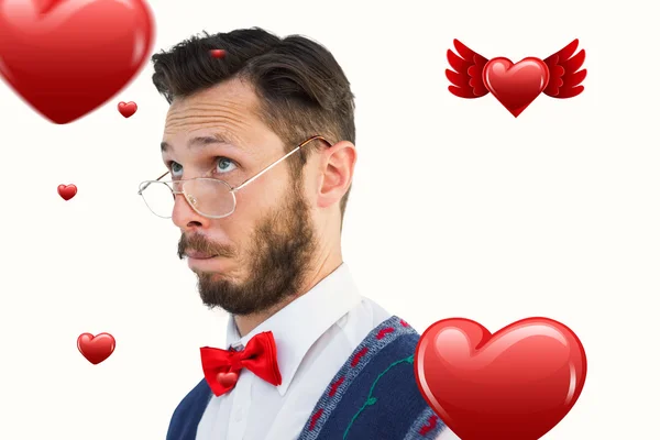 Geeky hipster wearing christmas vest — Stock Photo, Image