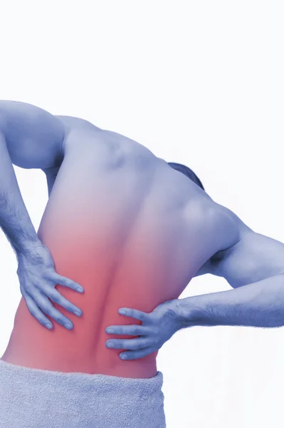 背中の痛みを上半身裸の男の背面図 — ストック写真