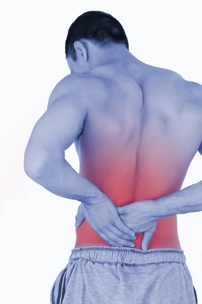 Young male suffering from back pain — Stock Photo, Image