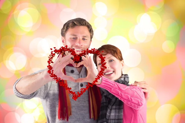 Paar maken van een hart-vorm — Stockfoto
