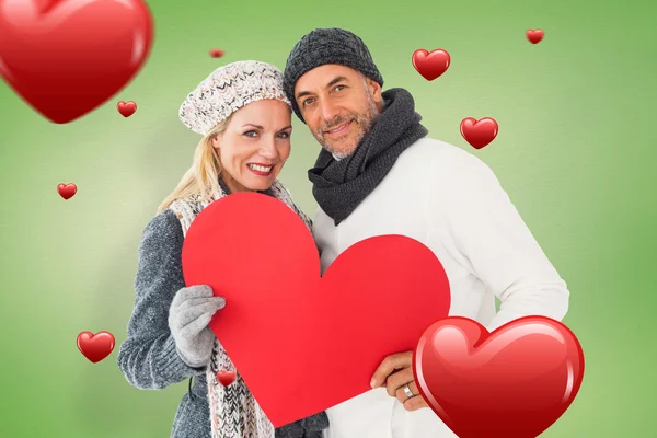 Smiling couple in winter fashion posing — Stock Photo, Image