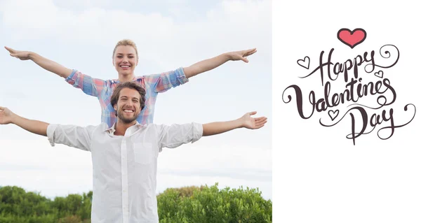 Cute couple standing outside with arms — Stock Photo, Image