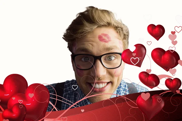 Geeky hipster covered in kisses — Stock Photo, Image