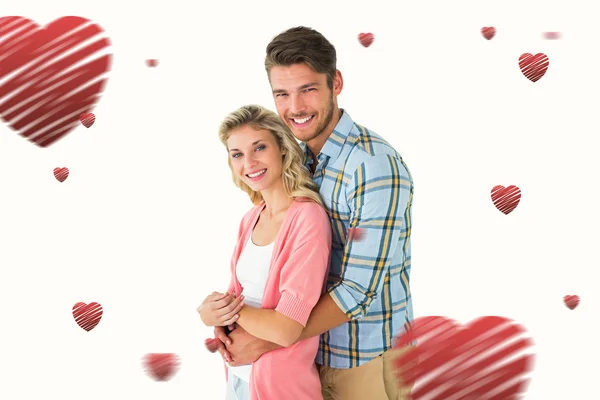 Casal atraente abraçando e sorrindo — Fotografia de Stock