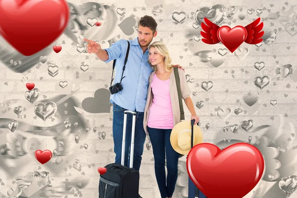 Attractive couple ready to go on vacation — Stock Photo, Image